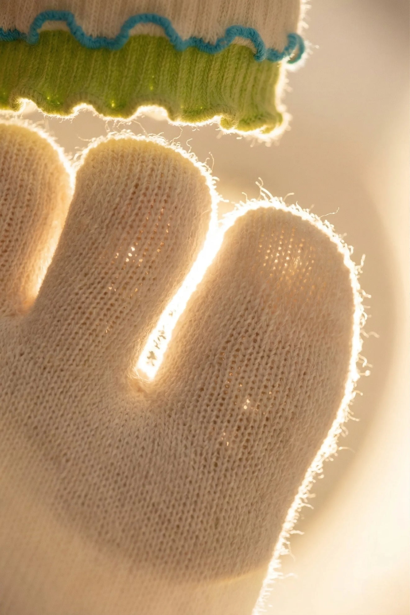 Macro backlit close-up of YG Socks premium combed cotton fabric, highlighting the soft texture, breathable knit, and advanced fiber performance for moisture-wicking and odor protection.